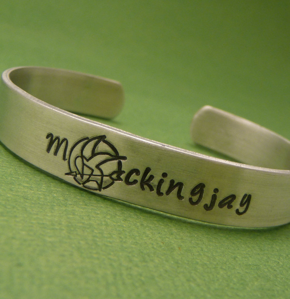 Hunger Games Inspired - Mockingjay - A Hand Stamped Aluminum Cuff Bracelet
