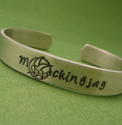 Hunger Games Inspired - Mockingjay - A Hand Stamped Aluminum Cuff Bracelet