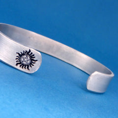 Supernatural Inspired - Non Tiembo Mala w/ Anti-Possession Symbol - A Hand Stamped Aluminum Bracelet