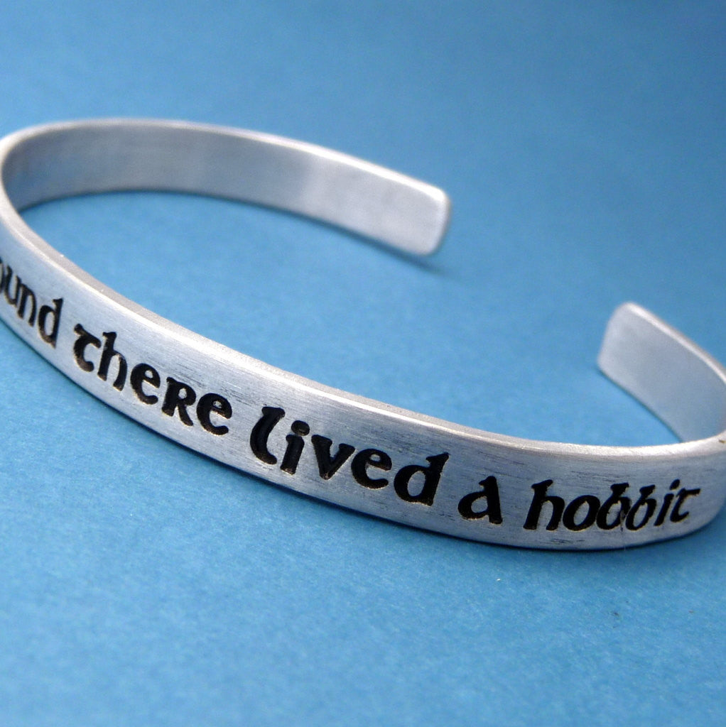 Tolkien Inspired - In A Hole In The Ground There Lived A Hobbit - A Hand Stamped Bracelet in Aluminum or Sterling Silver