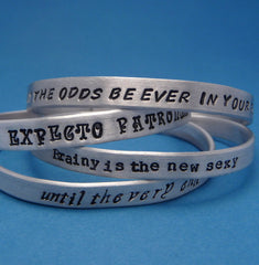 A Custom Hand Stamped on ONE SIDE 1/4 inch Aluminum Cuff Bracelet