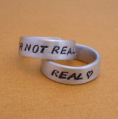 Hunger Games Inspired - Real or Not Real and Real - A Pair of Hand Stamped Aluminum Rings