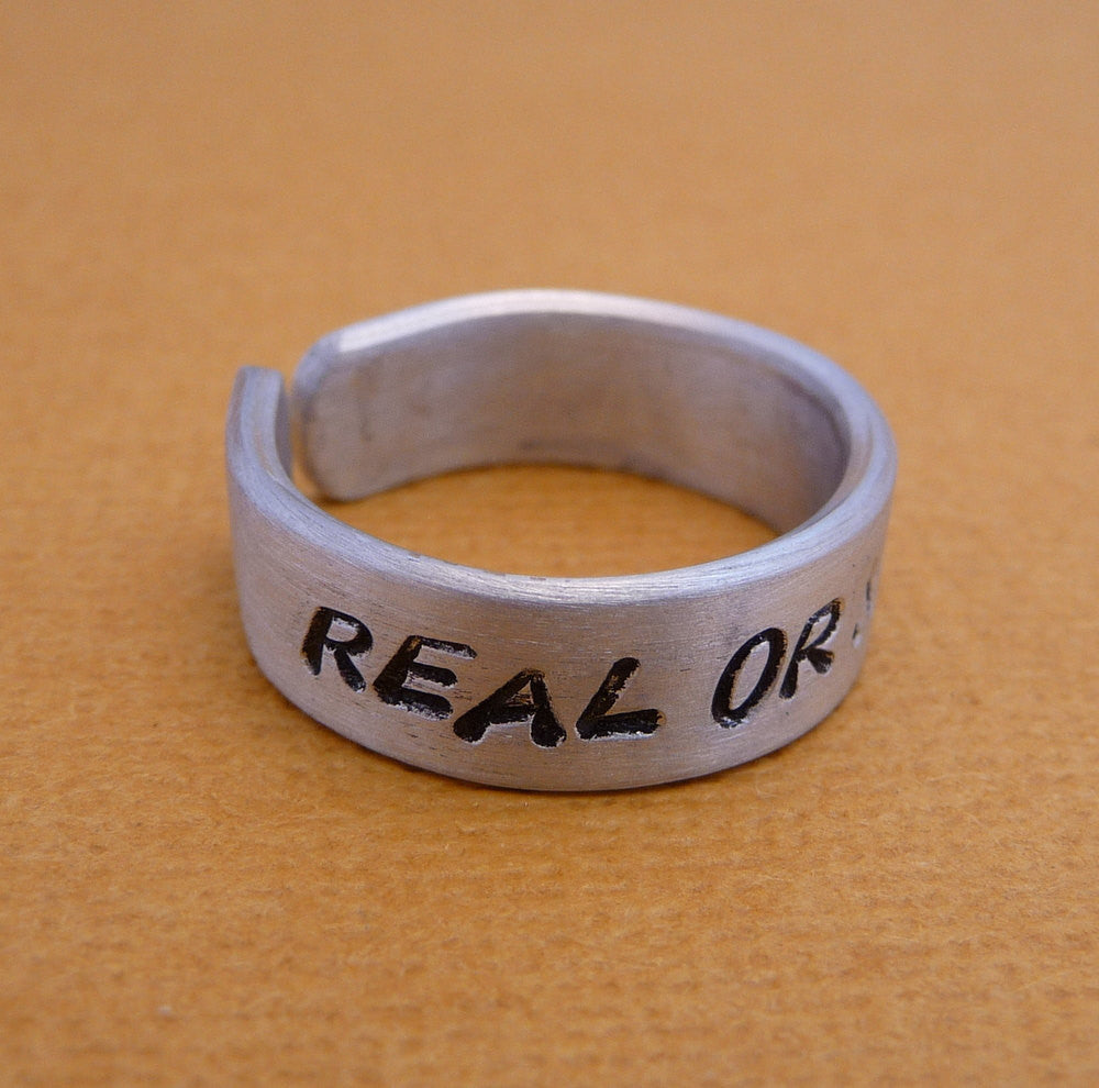 Hunger Games Inspired - Real Or Not Real - A Hand Stamped Aluminum Ring