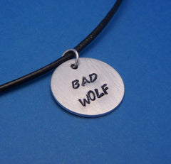 Doctor Who Inspired -  Bad Wolf - A Hand Stamped Aluminum Disc Necklace
